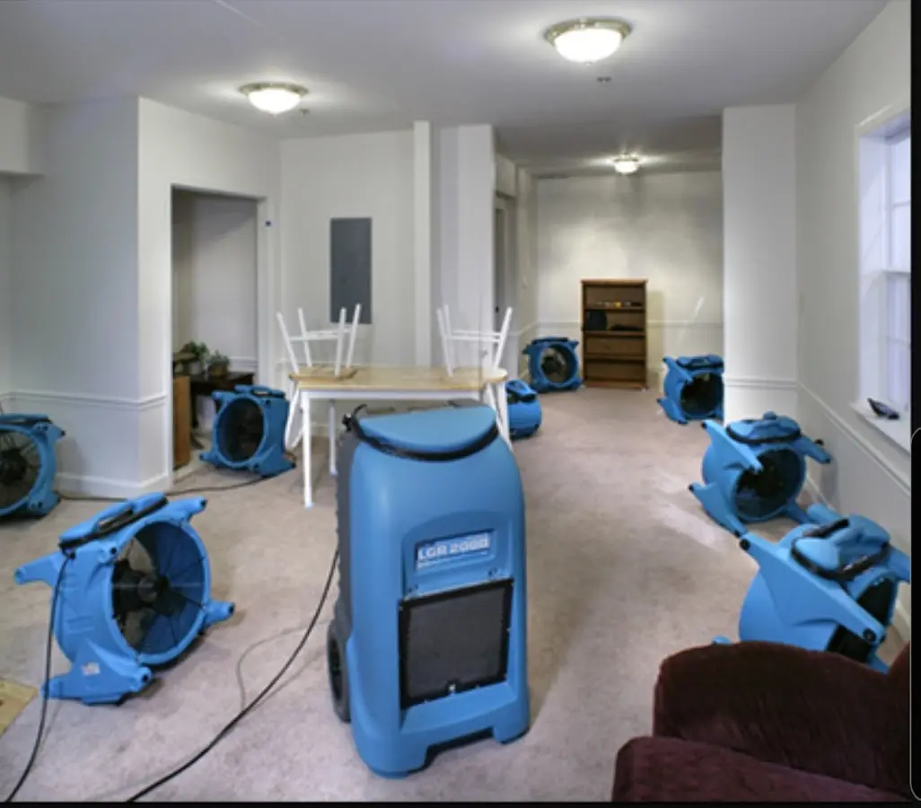 Air movers and dehumidifier setup for Water Damage Restoration in Long View
